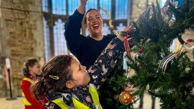 Step Into Christmas History: The Exchange Unveils Historic Christmas Tree Festival - BL 34 e1700747039185