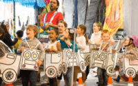 Children taking part in a creative cardboard car workshop at Blackburn’s National Festival of Making 2025.