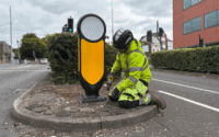 Council workers installing new reflective traffic bollards in Blackburn as part of £630,000 upgrade project