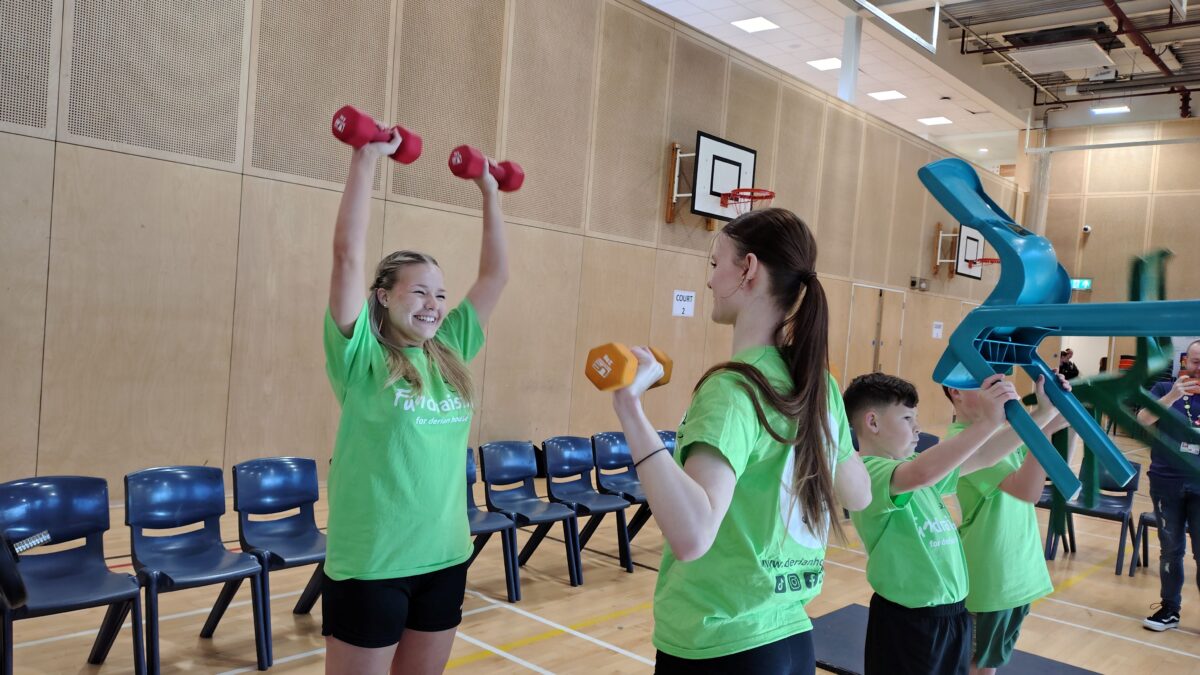 Darwen teacher’s 16-year fundraiser hits £100,000 as he retires - Mr Hartley's final annual army style circuit training fundraiser for pupils at Darwen Vale High School (1)